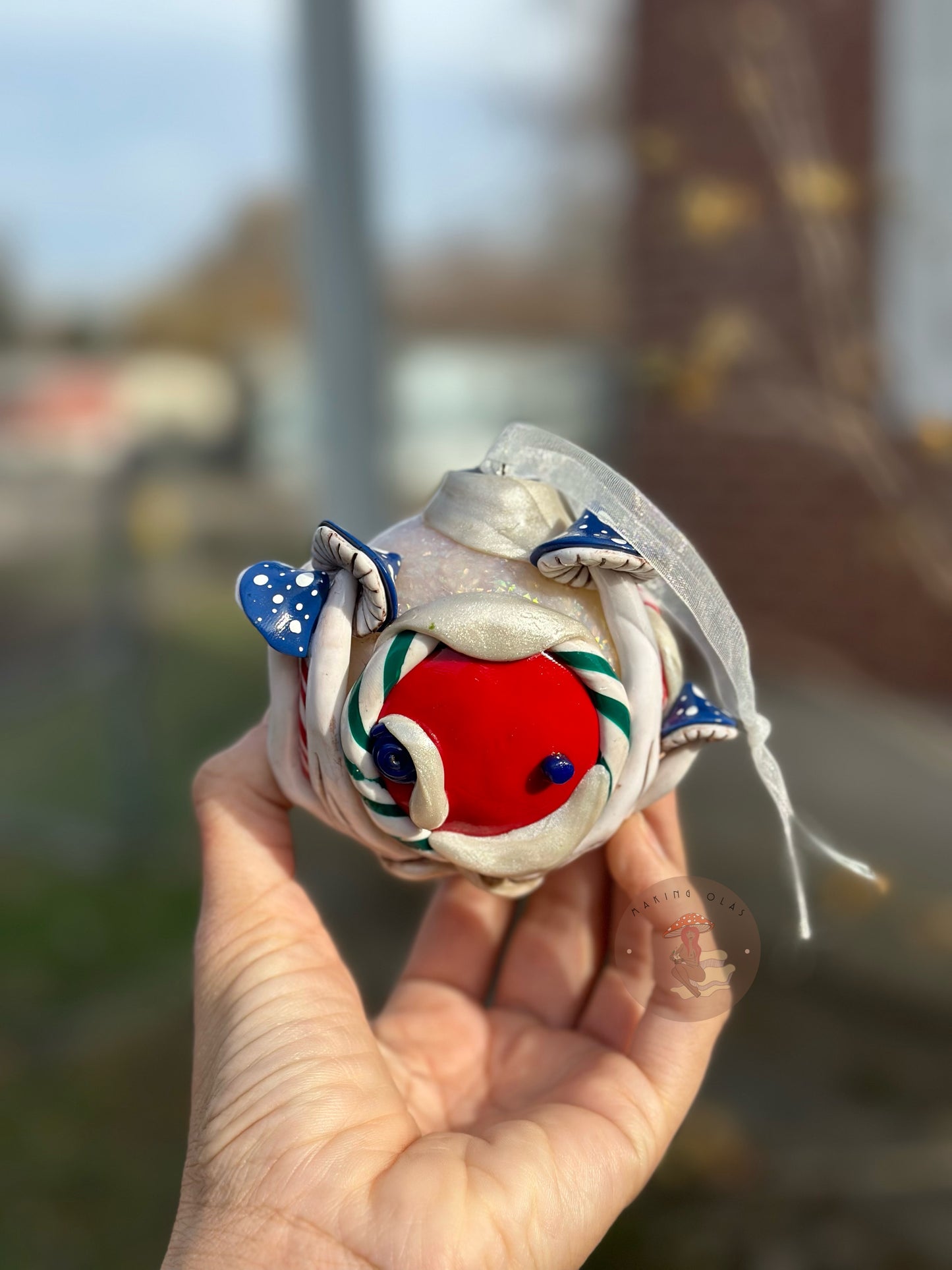 Ornament | Red Door on a Snowball with Blue Mushrooms